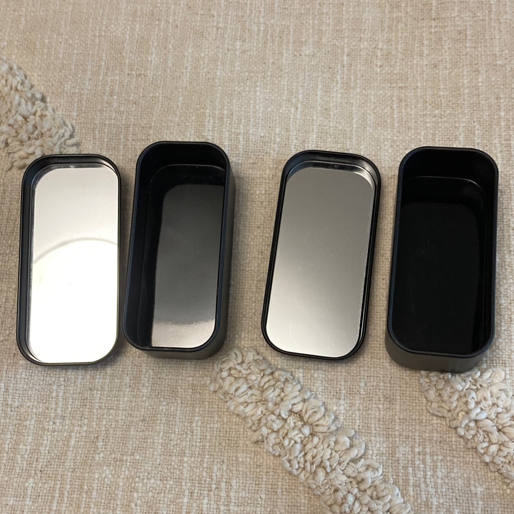 NUDESTIX Sleek Black Storage Tins with Inside Mirrors